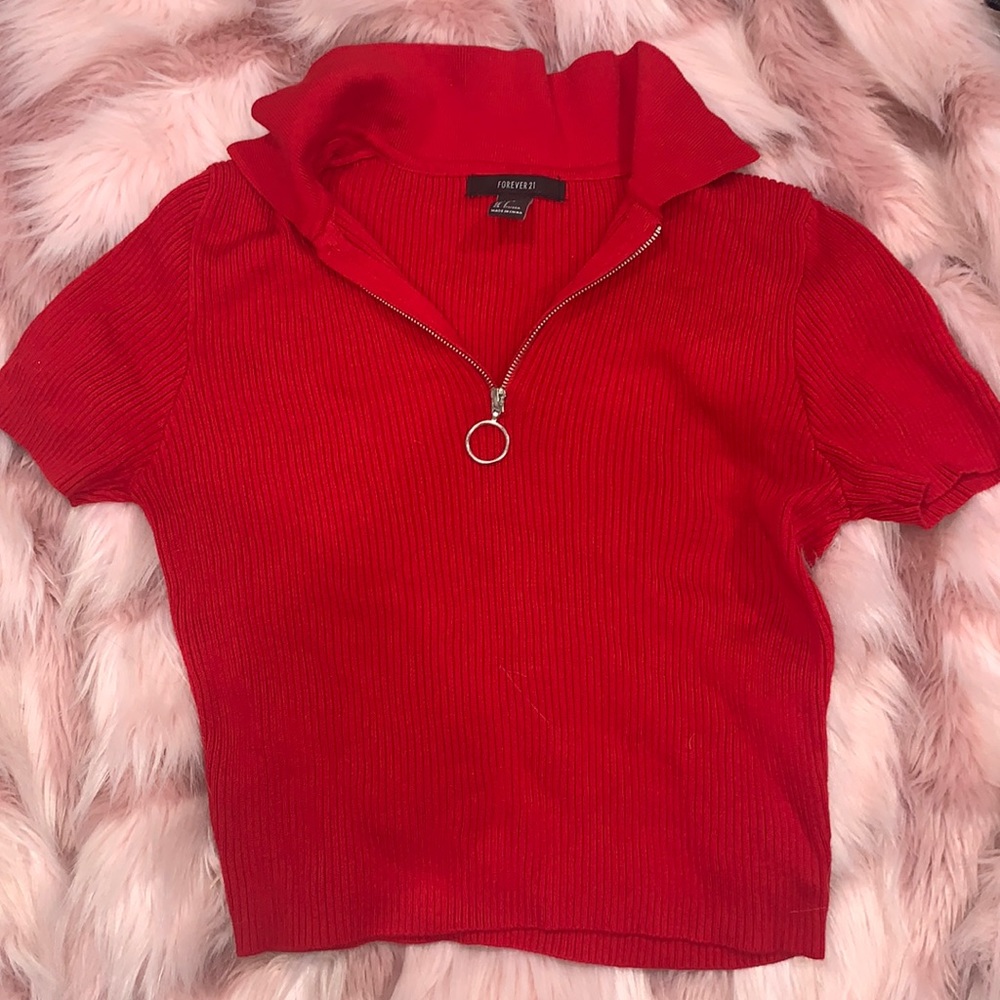 Red quarter zip with hoop on zipper